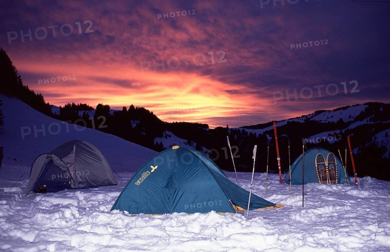 Winter bivouac, evening sky, sunset, tent, snow, snowshoes, Allgäu, Germany