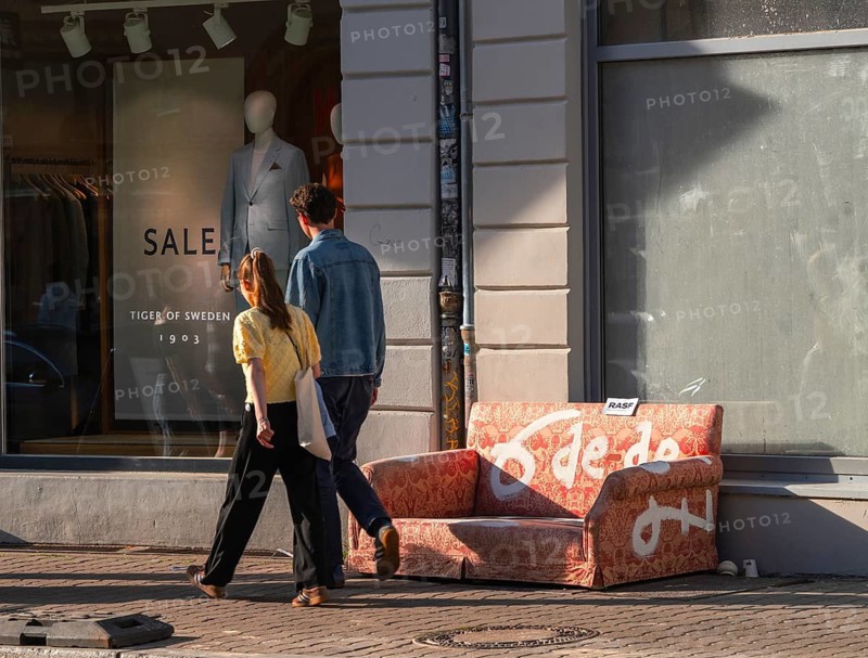Garbage parked on public roads, couch in orange, Neue Schönholzer Straße, Berlin, Germany