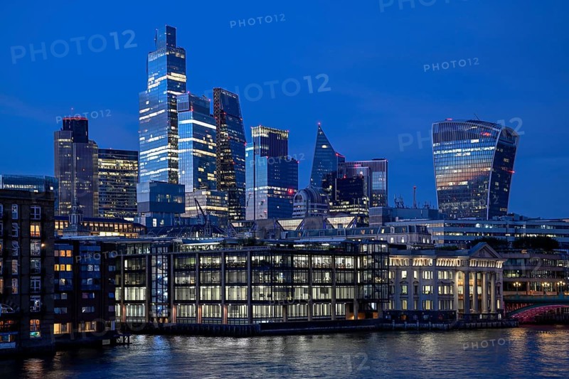 City of London skyline with skyscrapers 22 Bishopsgate, Leadenhall Building, Cheesegrater, and 20 Fenchurch Street, walkie talkie, on the Thames, blue hour, London, England, Great Britain, Great Britain