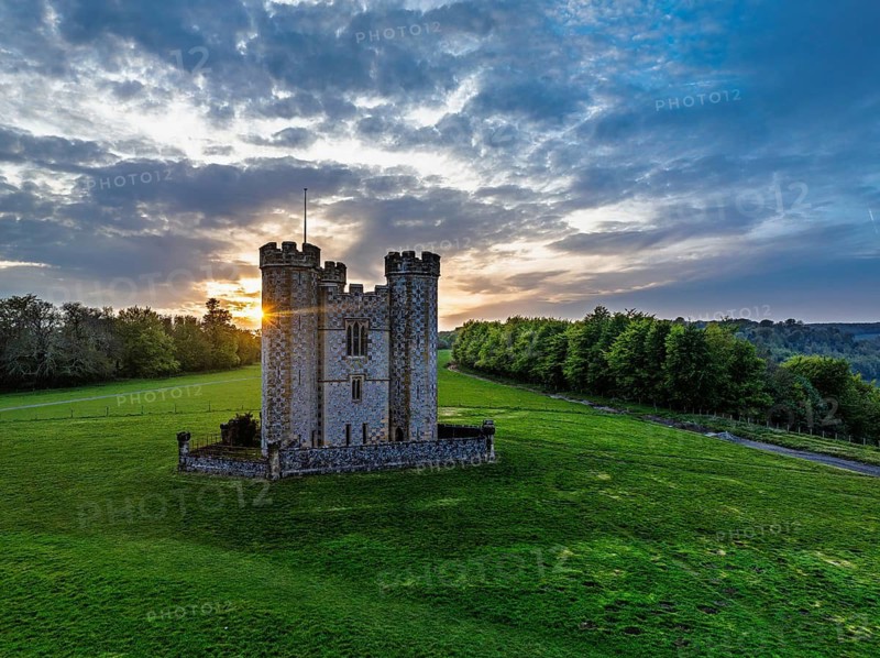 Sunset over Hiorne's Tower from a drone, Arundel, West Sussex, England, United Kingdom
