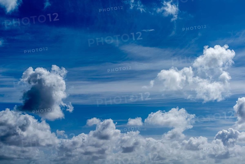 Fantastic blue sky with white clouds over the Schleswig-Holstein Wadden Sea National Park, North Frisia, cumulus (Cu) cumulus clouds, fair weather clouds, altostratus, cirrus, feather wakes, high pressure area, Schleswig-Holstein, Germany