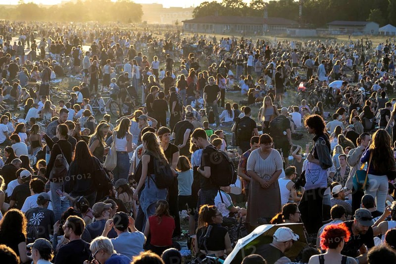 Impressions from the partial solar eclipse, 12/08/2026, crowds at Tempelhofer Feld, Berlin, Germany < english> Partial solar eclipse, August 12, 2026, Tempelhofer Feld, Berlin, Germany