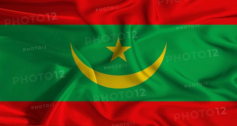 Colorful flag of Mauritania with a silky fabric texture waving. Realistic Mauritania flag waving