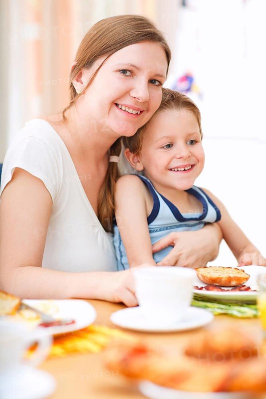 Mother and son having breakfast together, Finland, Scandinavia