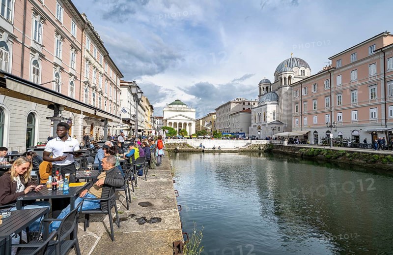 Restaurants on the Grand Canal with reflection, Sant'Antonio Taumaturgo church and Serbian Orthodox church Santissima Trinità e di San Spiridione, Borgo Teresiano, Trieste, Friuli-Venezia Giulia region, Italy