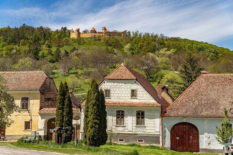 Farmhouses and Keisder Castle in Saschiz or Keisd, Transylvania, Romania