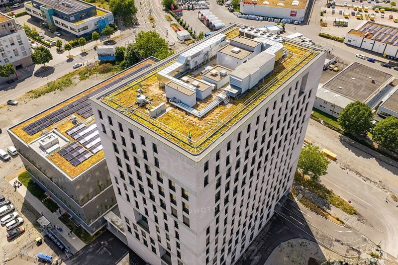 Roof view of a modern high-rise building with green use and urban environment, Boarding House of Klinikverbund Südwest, Böblingen, Germany