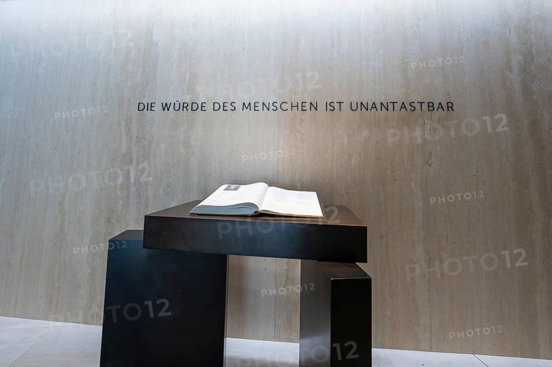 Table with an open book in front of an inspiring wall inscription, Parliament of Baden-Württemberg, Stuttgart, Germany
