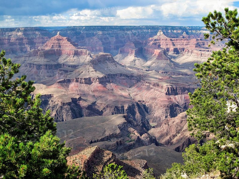 Spectacular Colorado River gorge with characteristic reddish rock formations and deep plateaus, typical panorama, viewpoint, hiking on the much-visited South Rim, Grand Canyon National Park, Arizona, USA