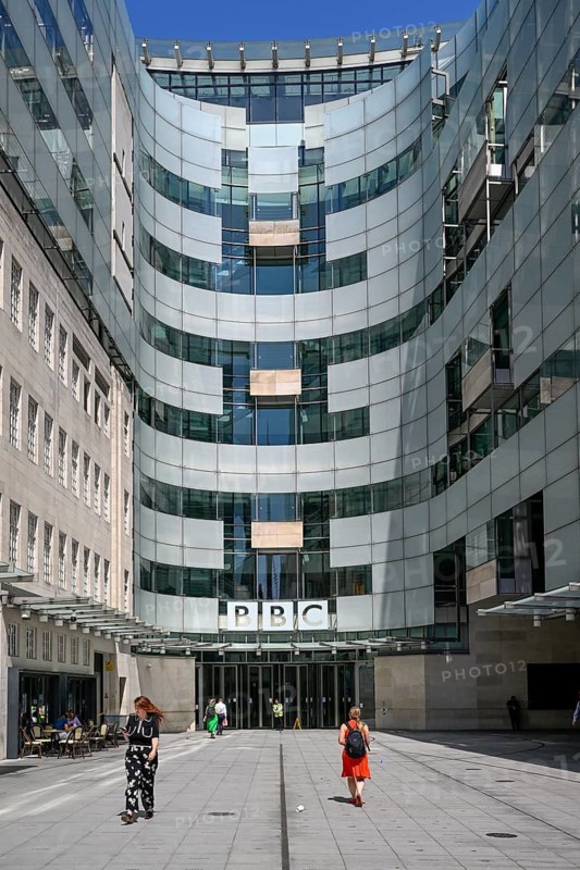 Entrance area of the BBC Broadcasting House with the distinctive curved glass façade and the BBC logo, Portland Place, City of Westminster, London, England, Great Britain, Great Britain