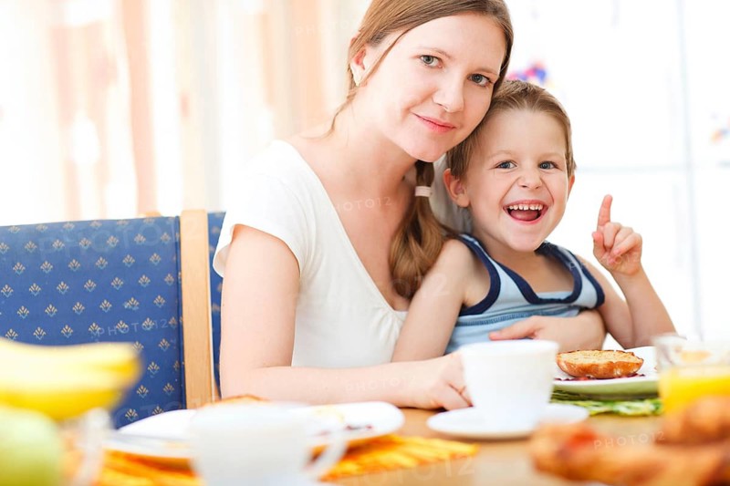 Mother and son having breakfast together, Finland, Scandinavia