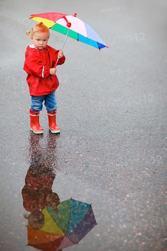 A little blonde girl with an umbrella, Scandinavia, Finland