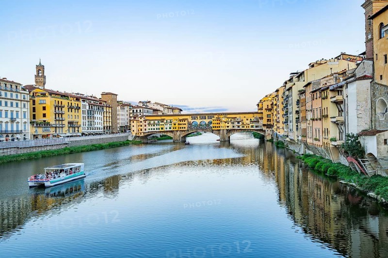 Ponte Vecchio bridge over Arno River at sunset, Florence, Tuscany, Italy
