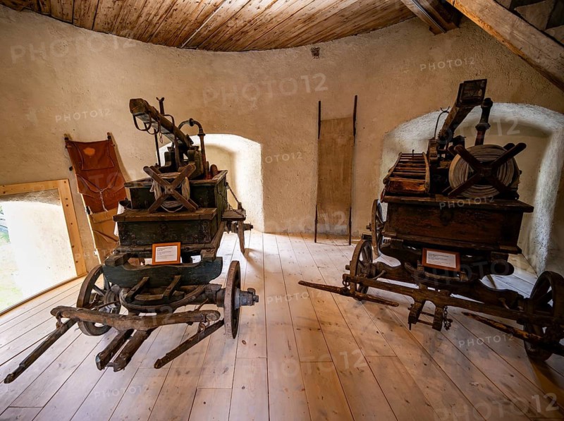Historic fire trucks with fire hoses, Hohenwerfen Fortress, Werfen, Pongau, Salzburger Land, Austria