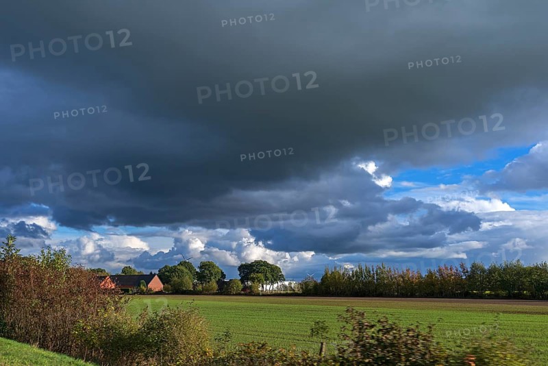 Rain clouds (Nimbostratus) and landscape, the Netherlands