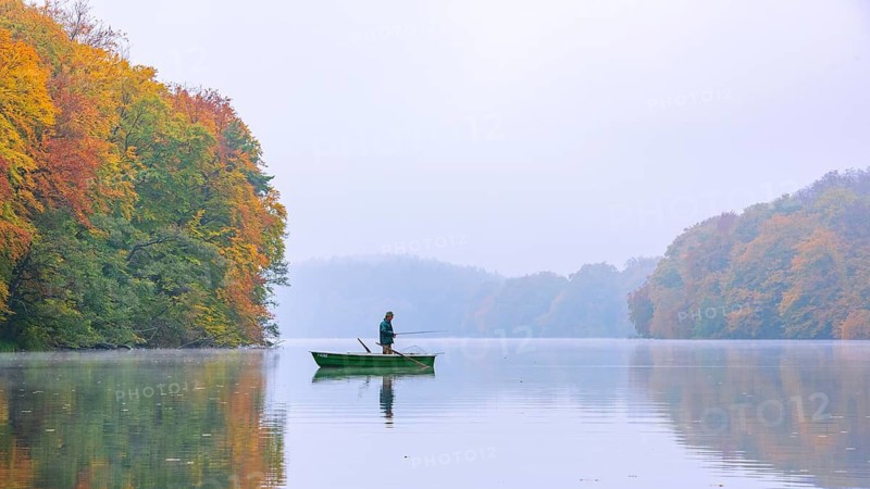 Anglers on the autumnal Schmale Luzin, lake in Mecklenburg-Western Pomerania, Feldberg Lake District, Mecklenburg-Western Pomerania, Germany