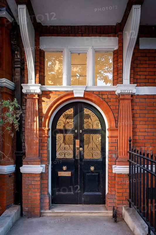 Elaborately designed house entrance, Victorian brick town house, Cadogan Gardens, Borough of Chelsea and Kensington, London, England, Great Britain