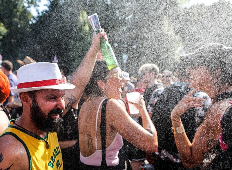 Techno demo Rave the Planet, Berlin, 15.08.2026, cooling off a techno car equipped with a water sprayer. The motto of the event is Imagine Love, hundreds of thousands of participants are expected on the 17th of June Street in the Tiergarten, Berlin, Germany