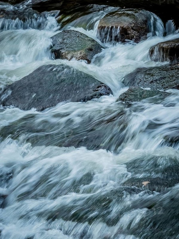 A stream with rocks and running water. Experience the landscape in nature, Austria
