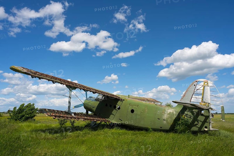 Abandoned old aircraft in a meadow under a clear blue sky, Antonov An-2 multi-purpose aircraft, biplane, abandoned airport, Ceadir-Lunga, Ceadîr-Lunga, Chadyr-Lunga, Taraclia district, Gagauzia autonomous region, Republic of Moldova, Moldova