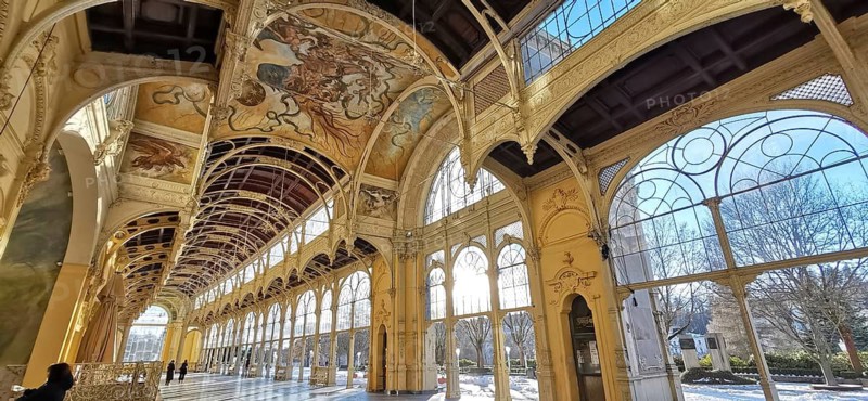 Historic arcades with frescoes and large windows creating a beautiful play of light, Maxim Gorky Kollonade, Marianske Lazne main colonade, Marienbad, Czech Republic