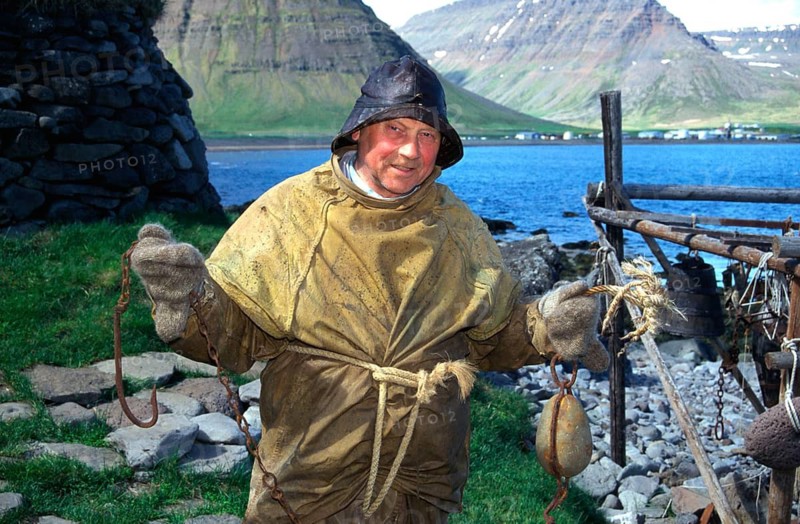 Basalt structure, Iceland, fishermen in leather clothes, basalt, volcanic rock, Bolungarvik, Westfjords, MR