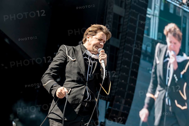 Singer Pelle Almqvist from the Swedish rock band The Hives live on the Utopia Stage during the Rock im Park Festival on the Zeppelin Field in Nuremberg, Germany on 07.06.2026