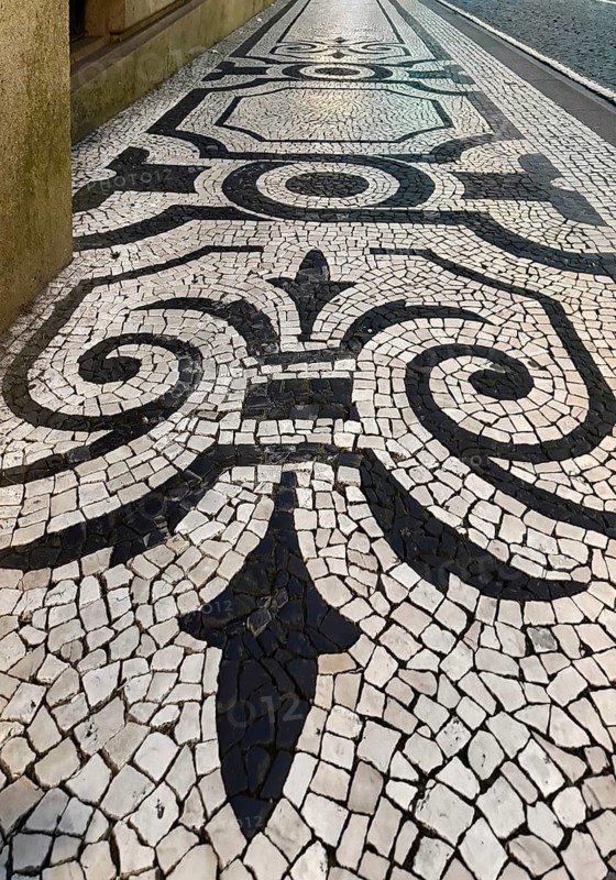 Black and white paving, Calçada Portugesa, traditional limestone and basalt mosaic paving, identity-creating cultural heritage, Porto, Portugal