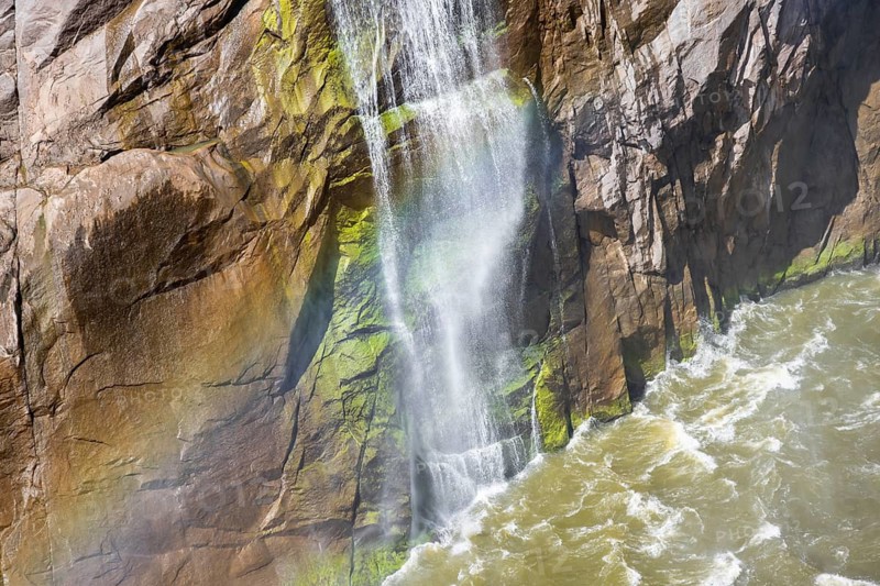Rainbow on tips at the Orange River waterfall, Augrabies Falls National Park, North Cape, South Africa