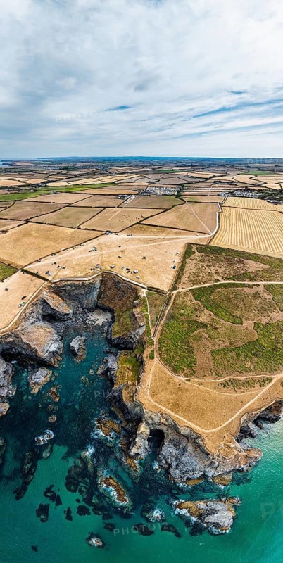 Panorama of Farms and Fields over Cliffs and Porthcothan Bay from a drone, Porthcothan, Padstow, Cornwall, England, United Kingdom, Summer 2026