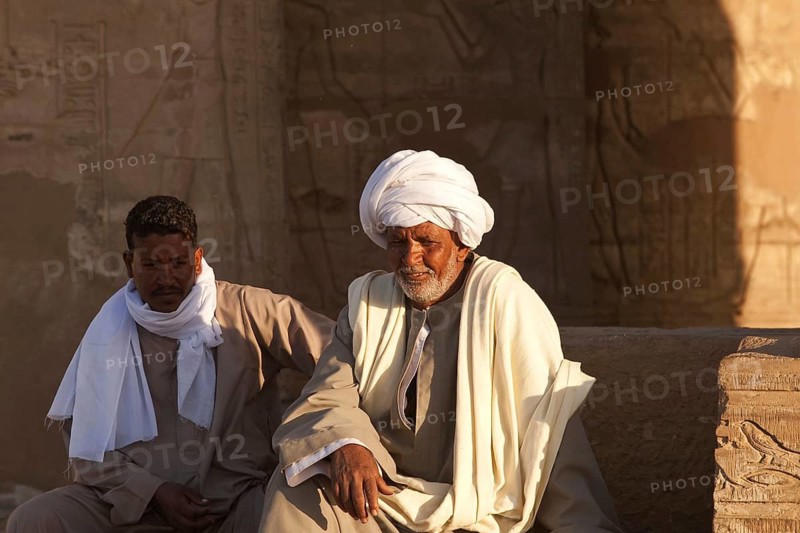 Middle East, Egypt, Egyptians, two Arabs, sitting, temple, Kom Ombo