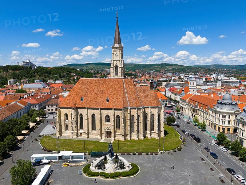 Panorama of a city with a church and a square surrounded by historic buildings, aerial view, St. Michael's Church in Cluj, Gothic hall church, statue of Matthias Corvinus, Cluj-Napoca, Cluj, Transylvania, Romania
