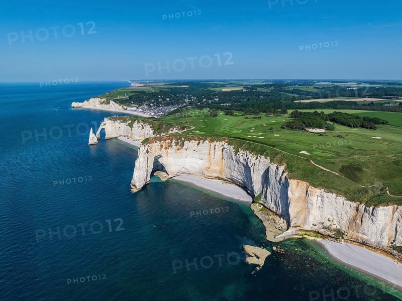 Aerial view of the rock gate La Manneporte rock gate behind the Porte d'Aval rock formation, well-known sights on the chalk coast with the distinctive rock pin, behind it the holiday resort of Étretat with the beach, on the horizon the Falaise d'Amont cliffs, right on the cliffs of the Golf d'Étretat golf course founded in 1908, Alabaster Coast, La Côte d'Albâtre, chalk cliffs, English Channel, Seine e-Maritime, Normandie, France