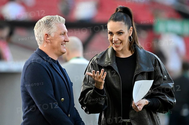 Bastian Schweinsteiger in interview, discussion with presenter reporter ARD Esther Sedlaczek, smiles, soccer Bundesliga, DFB-Pokal, MHPArena, MHP Arena Stuttgart, Baden-Württemberg, Germany