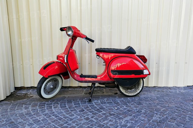 Red Vespa PX, iconic brand from Piaggio, retro, Nîmes, Languedoc-Roussillon, southern France, France