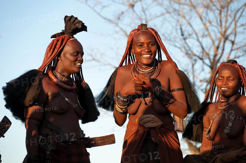 Himba woman dancing euphorically, traditional dance, traditional Himba village, Kaokoveld, Kunene, Namibia