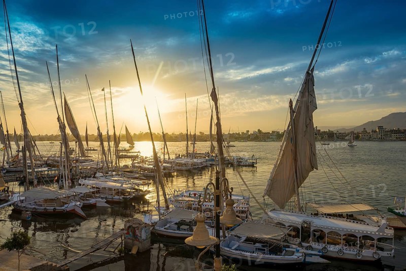 Sailing ships, feluks on the Nile, sunset, Luxor, Egypt