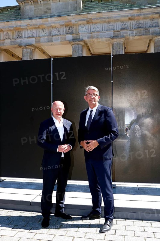 Kai Wegner (Governing Mayor of Berlin) and Wolfram Weimer (Federal Government Commissioner for Culture and the Media of the Federal Republic of Germany) ahead of the press conference marking the 65th anniversary of the construction of the Berlin Wall on Platz des 18. März in Berlin on 12 August 26