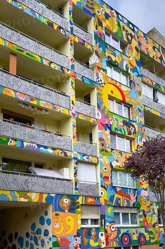 Apartment house decorated with decorative graffiti in the Mobit district of Berlin, Germany
