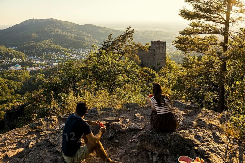 Couple having a picnic, Battert, Battertfelsen, Old Castle, Hohenbaden Castle ruins, sunset, Baden-Baden, Northern Black Forest, Black Forest, Baden-Württemberg, Germany