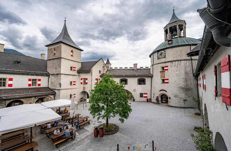 Castle courtyard building with beer garden and clock tower, Hohenwerfen Fortress, Werfen, Pongau, Salzburger Land, Austria