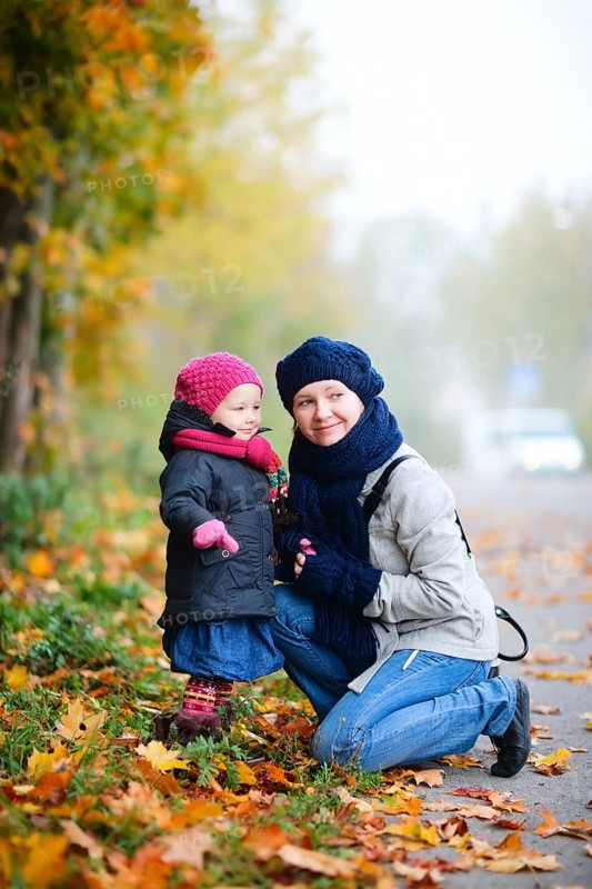 Mother and daughter walking in the forest, autumn, autumn forest, fog, Finland, Scandinavia