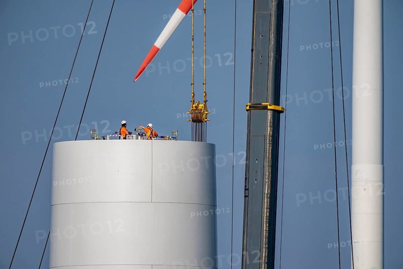Construction site of the new Bedburg 3 wind farm, on recultivated open-cast mining site, 9 wind power plants with an output of 60 megawatts are being built, installation of the wind turbine tower operated by RWE and the city of Bedburg, North Rhine-Westphalia, Germany