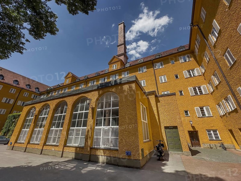Yellow residential buildings, courtyard, borstei, heritage-protected residential development, Munich, Bavaria, Germany