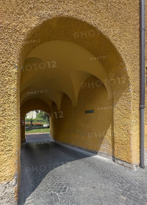 Passage through residential block, borstei, heritage-protected residential development, Munich, Bavaria, Germany