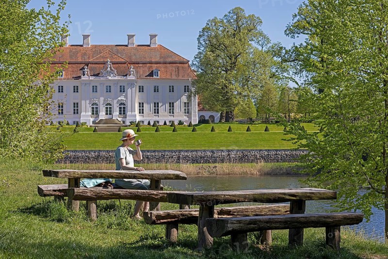 Meseberg Castle, Baroque Castle, Guesthouse of the German Federal Government, rest area, woman drinking coffee, Huwenowsee, Meseberg, Brandenburg, Germany
