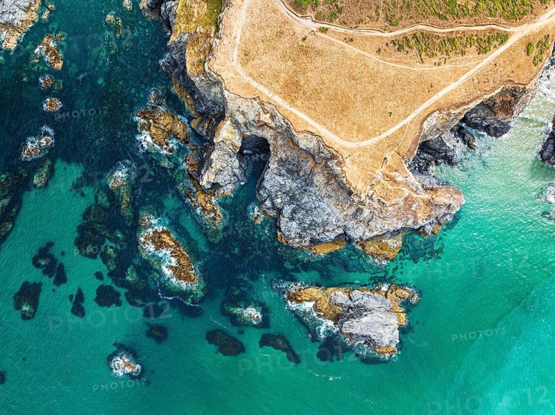 Top Down view of Cliffs over Porthcothan Bay from a drone, Porthcothan, Padstow, Cornwall, England, United Kingdom, Summer 2026