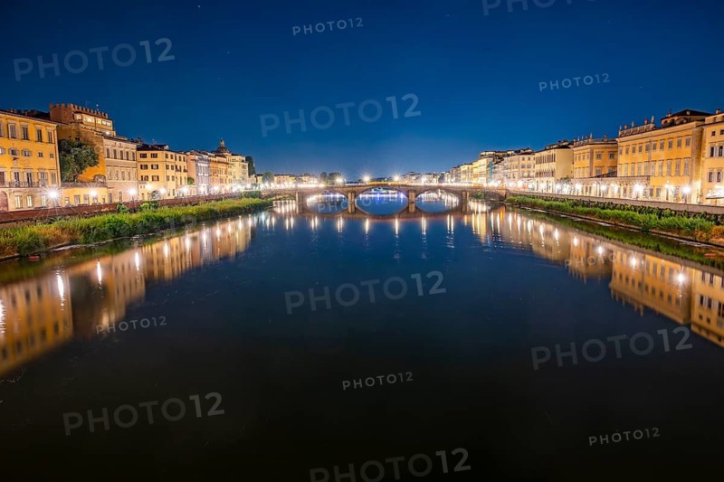 Promenade with arno river in front at blue hour, Florence, UNESCO World Heritage Site, Tuscany, Italy