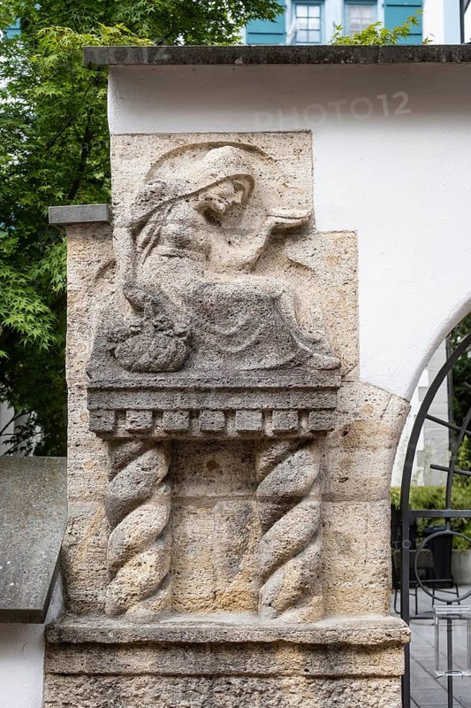 Stone relief of Saint Sebastian, plague patron from 1615 on the portal of the hospital chapel in the old town of Radolfzell am Lake Constance, district of Constance, Baden-Württemberg, Germany