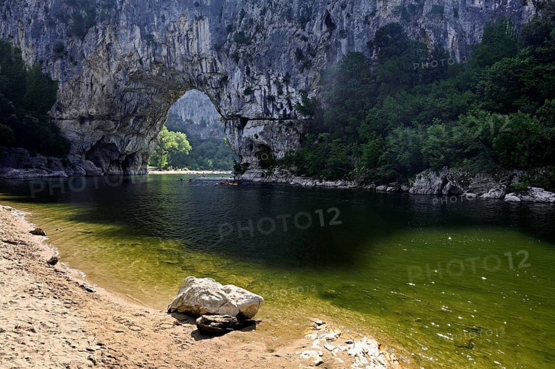 Canoes on the Ardèche river, above the Pont d'Arc rock gate, Ardèche Gorge, Gorges de l'Ardèche, Vallon-Pont-d'Arc, Rhône-Alpes, France